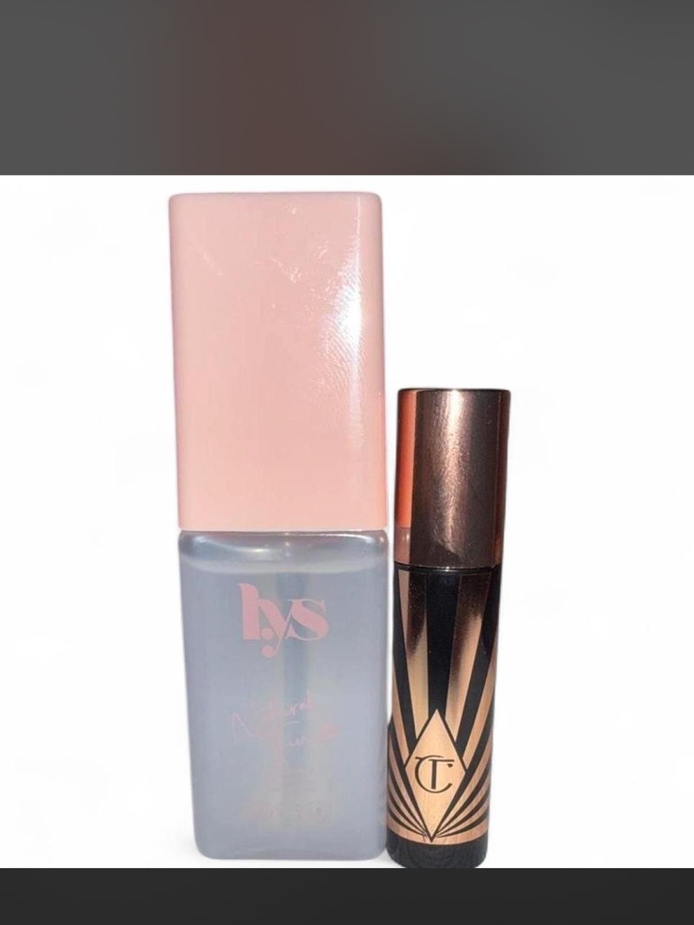 LYS natural finish skin loyalty setting spray and Charlotte Tilbury EXAGGER-EYES